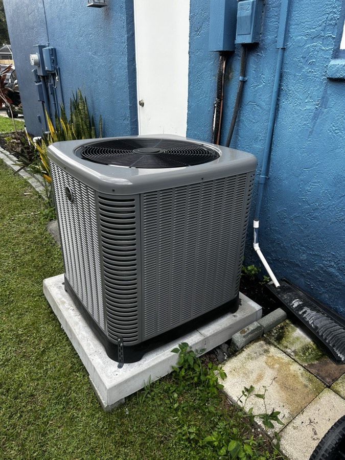 Outdoor condenser installation by Correct Cooling