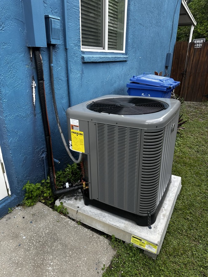 Outdoor condenser on a new pad